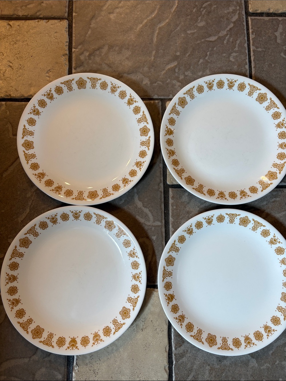Lot four Corelle butterfly gold 8 inch plates